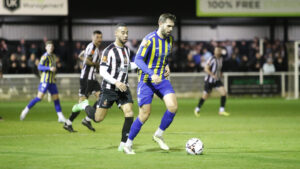 Spennymoor Town's Junior Mondal in action against King's Lynn Town