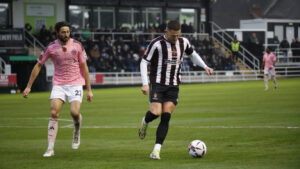 Spennymoor Town midfielder Rob Ramshaw in action against Curzon Ashton