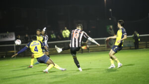 Spennymoor Town midfielder Rob Ramshaw scores against Scunthorpe United