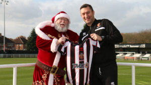 Santa Claus with Spennymoor Town boss Graeme Lee