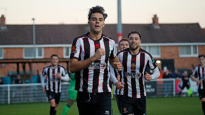 Spennymoor Town midfielder Isaac Fletcher celebrates his goal against South Shields