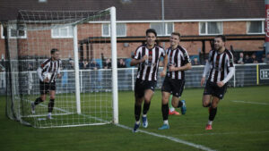 Spennymoor Town midfielder Isaac Fletcher celebrates his goal against South Shields