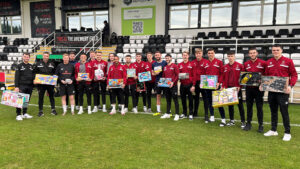 Spennymoor Town players and staff with their donations to the Club's Toy Appeal