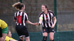 Spennymoor Town Ladies players Caitlin Bates and Autumn Colledge celebrate