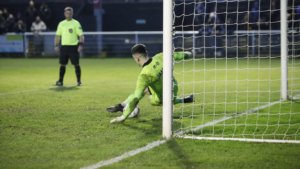 Spennymoor Town keeper Brad James saves a penalty against Boston United