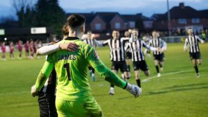 Brad James and Reece Staunton celebrate penalty shootout victory for Spennymoor Town