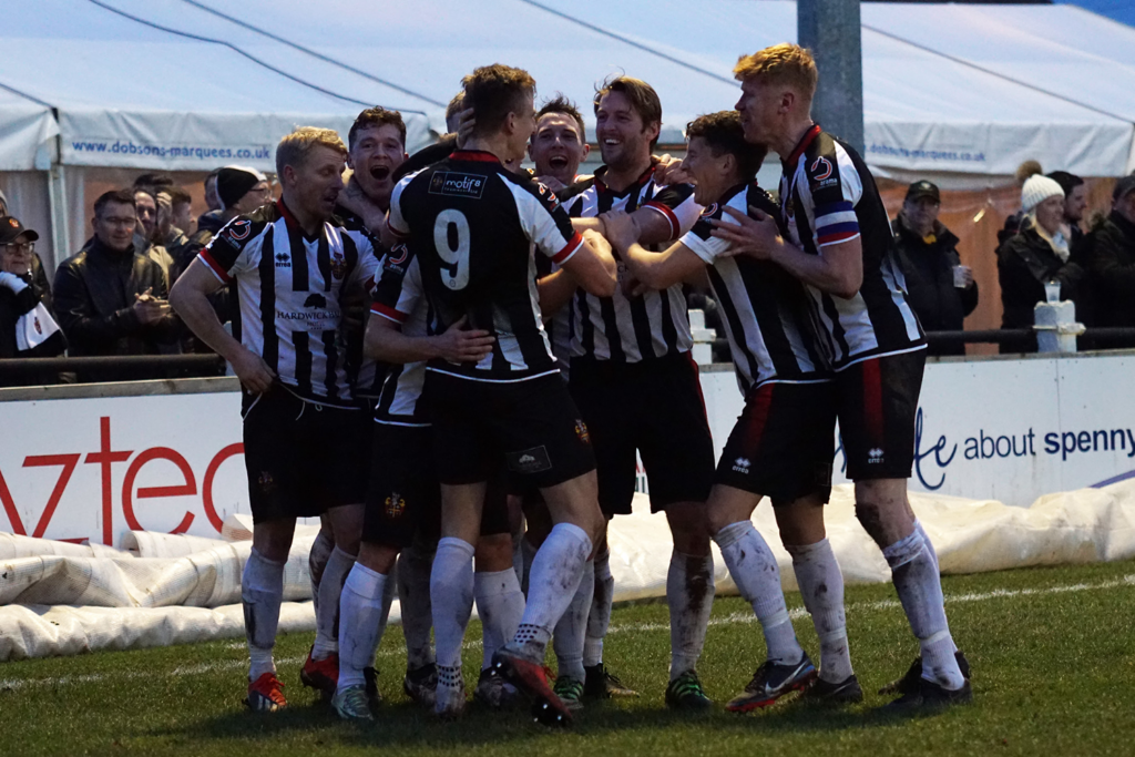 The players celebrate during the win over Sutton United in 2019