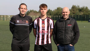 Spennymoor Town Academy Coach Matty Dolan with player Ethan Docherty and Aztec Managing Director Lee Redford