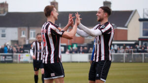 Spennymoor Town's Glen Taylor and Reece Staunton celebrate a goal against Farsley Celtic