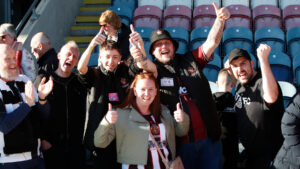 Spennymoor Town fans celebrate at Rochdale