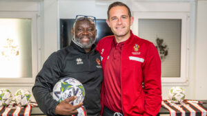Guardian Alliance's Chris Mutumbwa with Spennymoor Town midfielder Matty Dolan