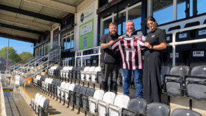 Spennymoor Town's Stephen Gilling with High Hill Farm owners