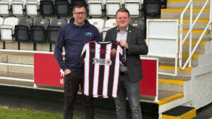 Penshaw View's Chris Breckon with Spennymoor Town's Ian Geldard