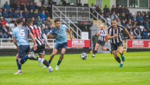Junior Mondal and Glen Taylor in action for Spennymoor Town against Bishop Auckland