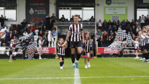 Spennymoor Town striker Glen Taylor is given a guard of honour