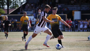 Spennymoor Town's Olly Dyson fires home against Crook Town
