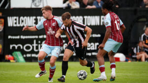 Spennymoor Town defender Olly Dyson in action against Scunthorpe United