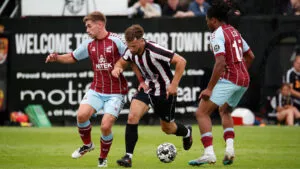 Spennymoor Town defender Olly Dyson in action against Scunthorpe United