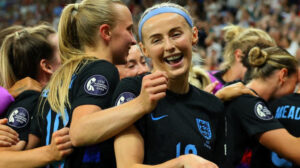 The Lionesses celebrate their semi-final win over Italy