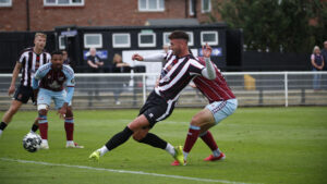 Spennymoor Town striker Gary Madine scores against Scunthorpe United