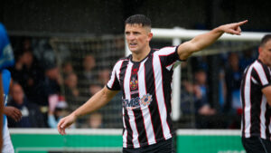 Spennymoor Town midfielder Rob Ramshaw in action against Stockport County