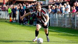 Spennymoor Town midfielder Mackenzie Heaney in action