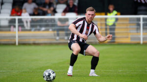 Spennymoor Town midfielder Mackenzie Heaney in action