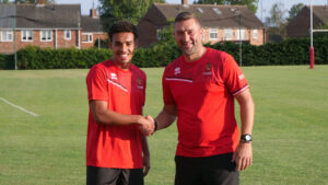 Spennymoor Town boss Graeme Lee with defender Tyler Hill