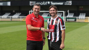 Spennymoor Town boss Graeme Lee with new signing Dan Jones