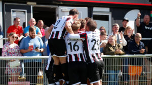 Spennymoor Town players celebrate a goal at The Brewery Field