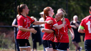 Spennymoor Town Ladies midfielder Amy Richardson celebrates with teammates after scoring