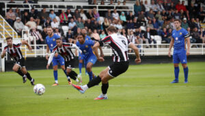 Spennymoor Town striker Glen Taylor scores from the penalty spot