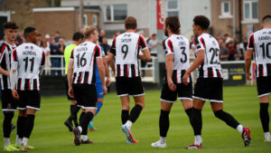 Spennymoor Town players celebrate Glen Taylor's goal