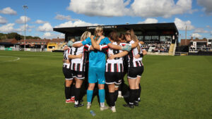 Spennymoor Town Ladies go in to a pre-match huddle at The Brewery Field