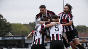 Spennymoor Town players celebrate a goal against Merthyr Town
