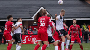 Spennymoor Town in action against Darlington at Blackwell Meadows