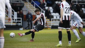 Spennymoor Town midfielder Ethan Robson scores against AFC Fylde
