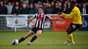 Spennymoor Town defender Dan Rowe in action against Barrow