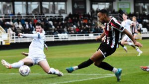 Spennymoor Town striker Junior Mondal in action against AFC Fylde
