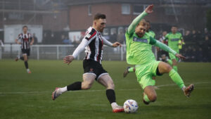 Spennymoor Town midfielder Mackenzie Heaney in action against Oxford City