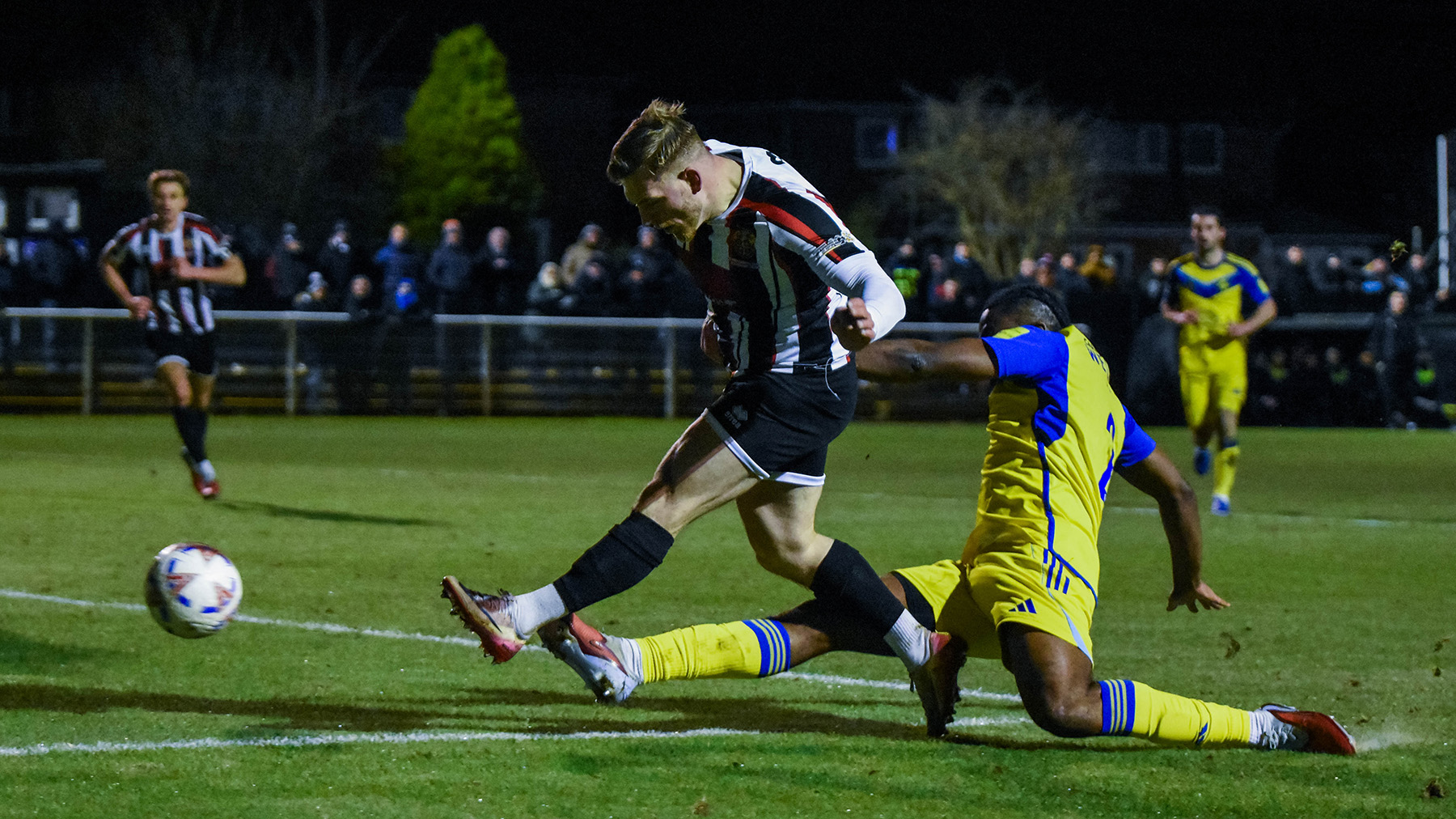 Spennymoor Town midfielder Mackenzie Heaney shoots on goal