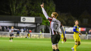Spennymoor Town midfielder Mackenzie Heaney celebrates his goal against Scarborough Athletic