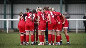 Spennymoor Town Ladies players form a pre-match huddle