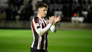 Spennymoor Town midfielder Rob Ramshaw claps fans at The Brewery Field