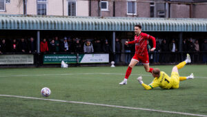 Spennymoor Town midfielder Rob Ramshaw scores a goal against Marine