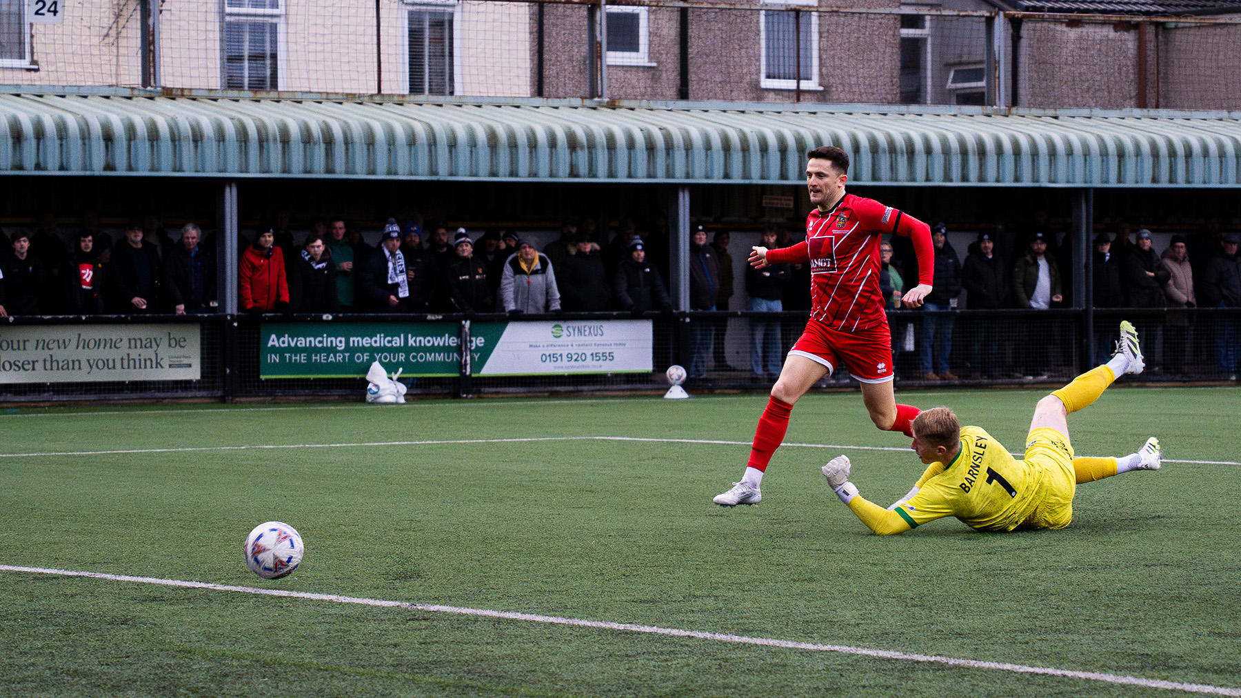 Spennymoor Town midfielder Rob Ramshaw scores a goal against Marine