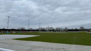 Covers on the pitch at Leamington's Your Co-op Community Stadium