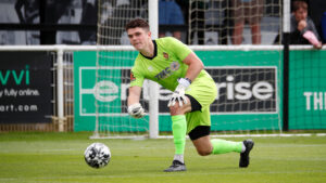 Spennymoor Town goalkeeper Brad James rolls the ball out