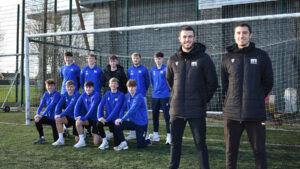 Spennymoor Town defender Ben Beals with Archie Hughes and his teammates