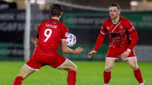Glen Taylor and Mackenzie Heaney in action for Spennymoor Town at Hereford